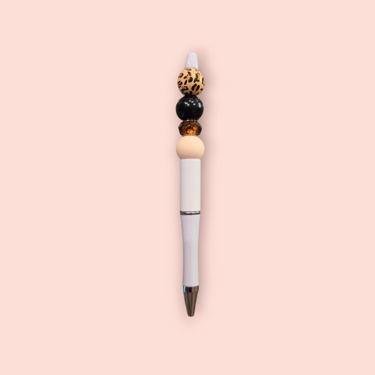 White & leopard pen