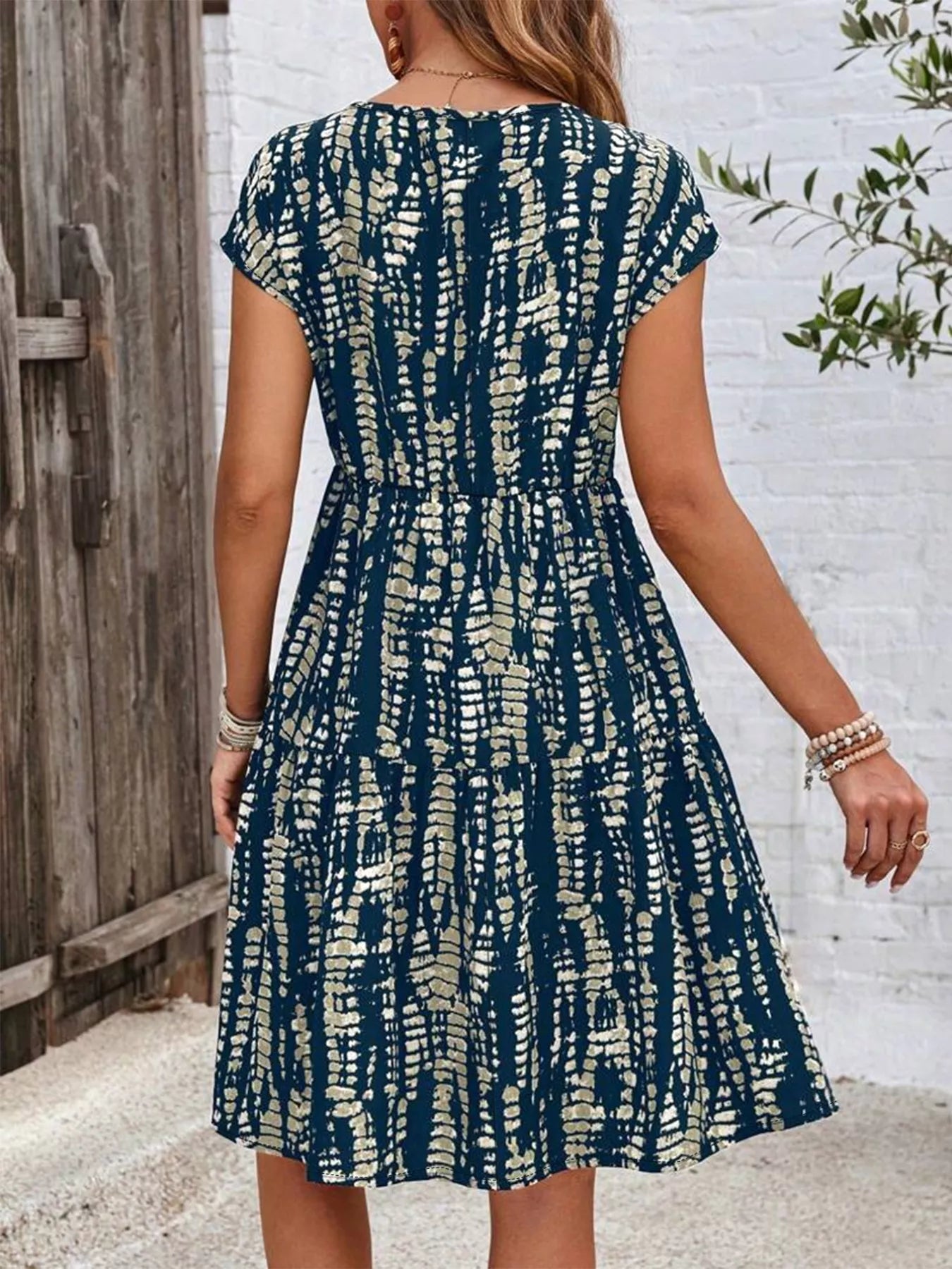 Plus Size Printed Long Sleeve Ruffle Hem Mini Dress - Bayou Curves